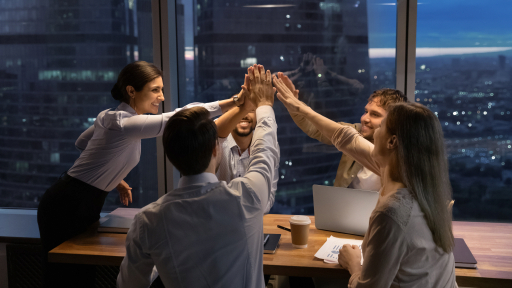 Team collaborating at a screen