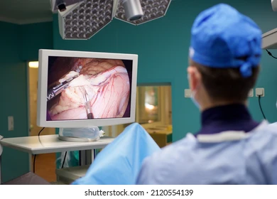 Surgeon viewing laparoscopic imaging on a medical monitor